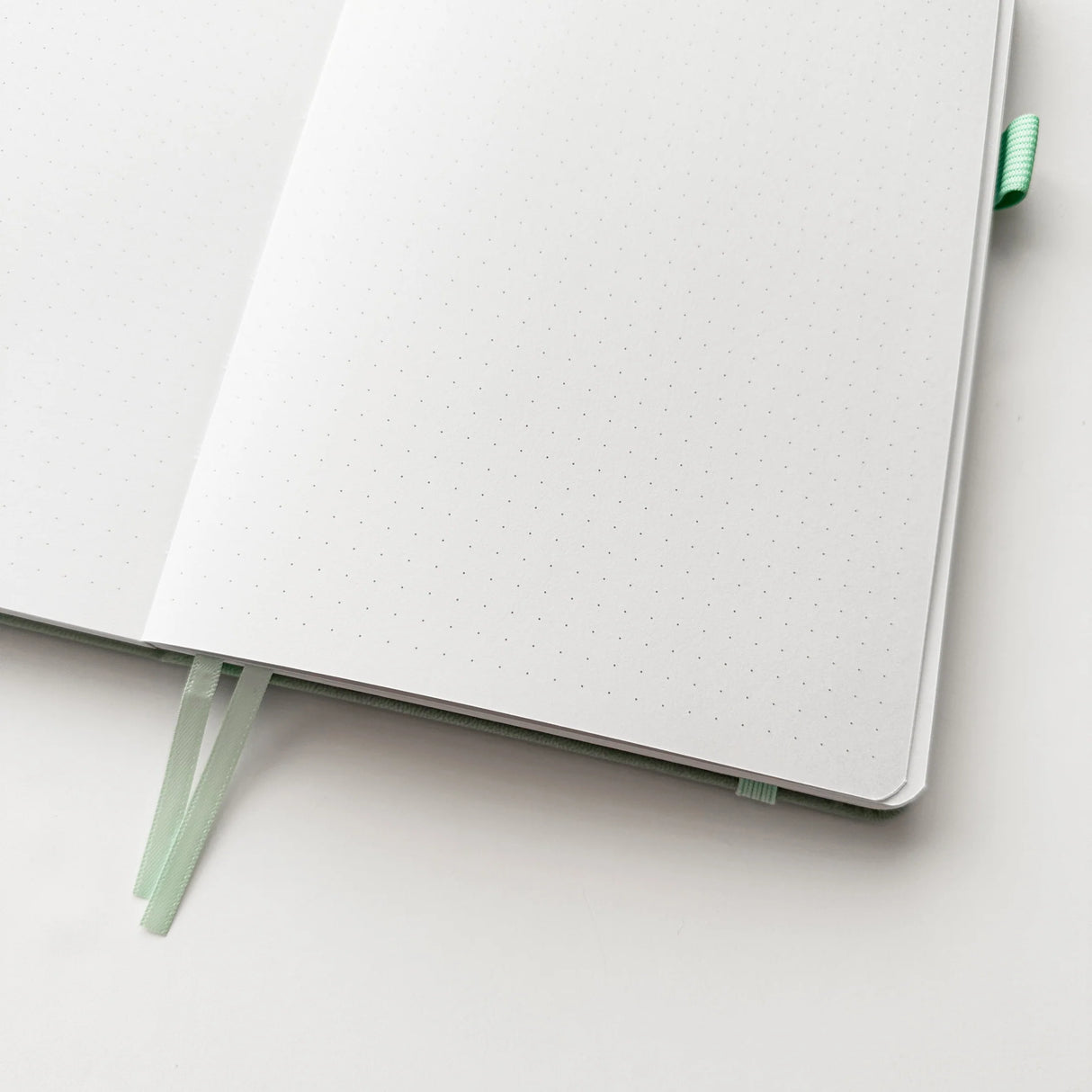 Bunny Spirit Journal in Sage Green with Gold Foil Logo🌱
Product Details:
Size: A5 (5.70 x 8.26 inches)
160 Dotted Grid Pages (5 x 5 mm)
2 Bookmarks
Elastic Band and Pen Holder
Expandable storage compartment