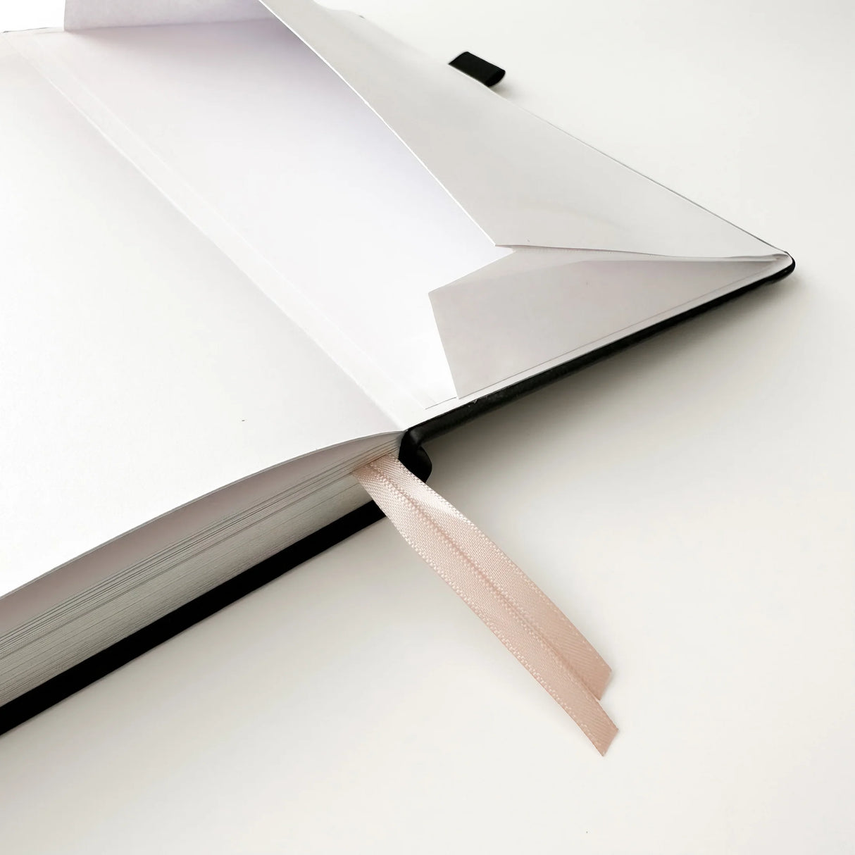 Soot Spirits Journal with Holographic Edges and Logo! ✨
Product Details:
Size: A5 (5.70 x 8.26 inches)
160 Dotted Grid Pages (5 x 5 mm)
2 Bookmarks
Elastic Band and Pen Holder
Expandable storage compartment