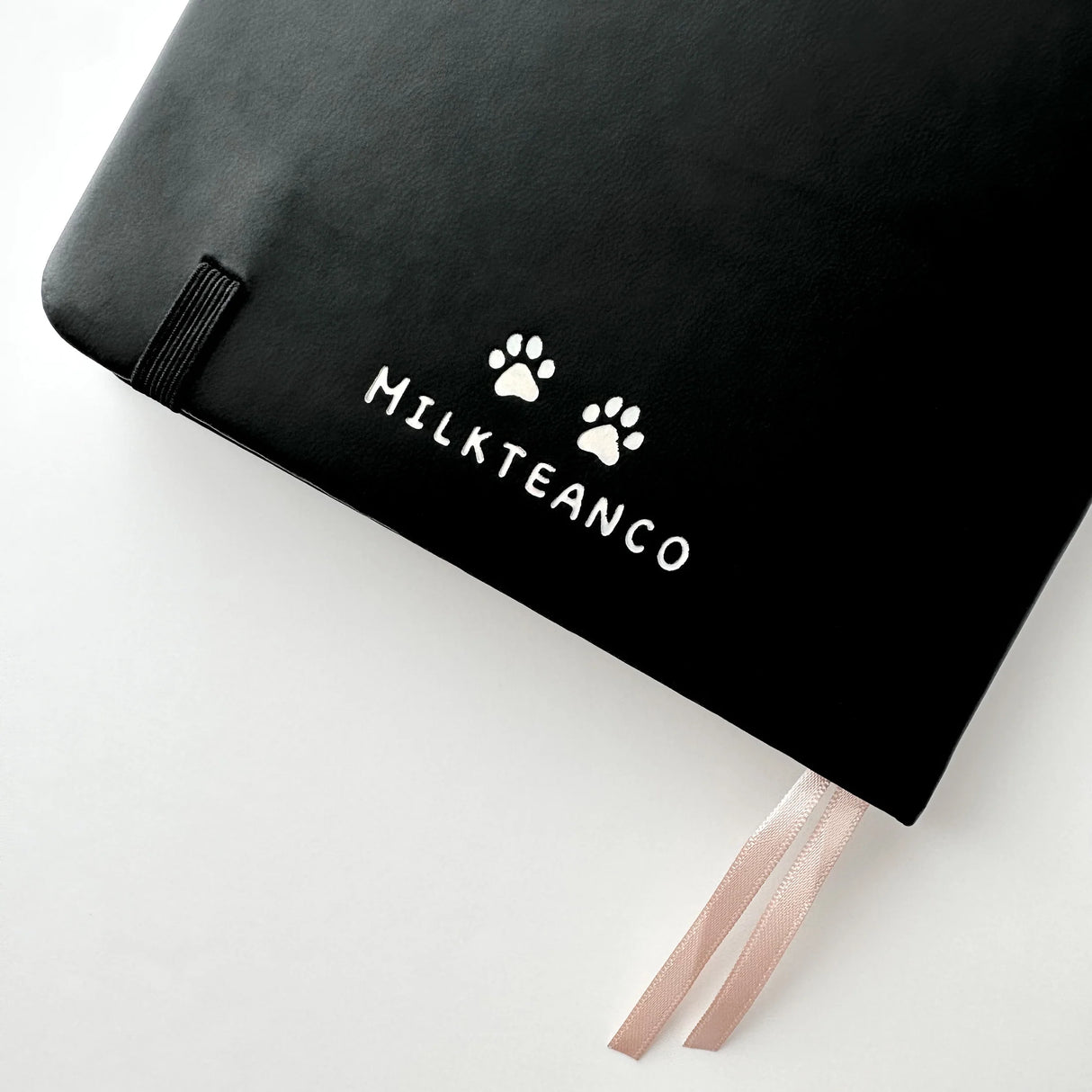 Soot Spirits Journal with Holographic Edges and Logo! ✨
Product Details:
Size: A5 (5.70 x 8.26 inches)
160 Dotted Grid Pages (5 x 5 mm)
2 Bookmarks
Elastic Band and Pen Holder
Expandable storage compartment