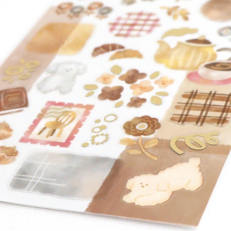 Sheet of decorative stickers with various designs including animals, food, and patterns on a white background.