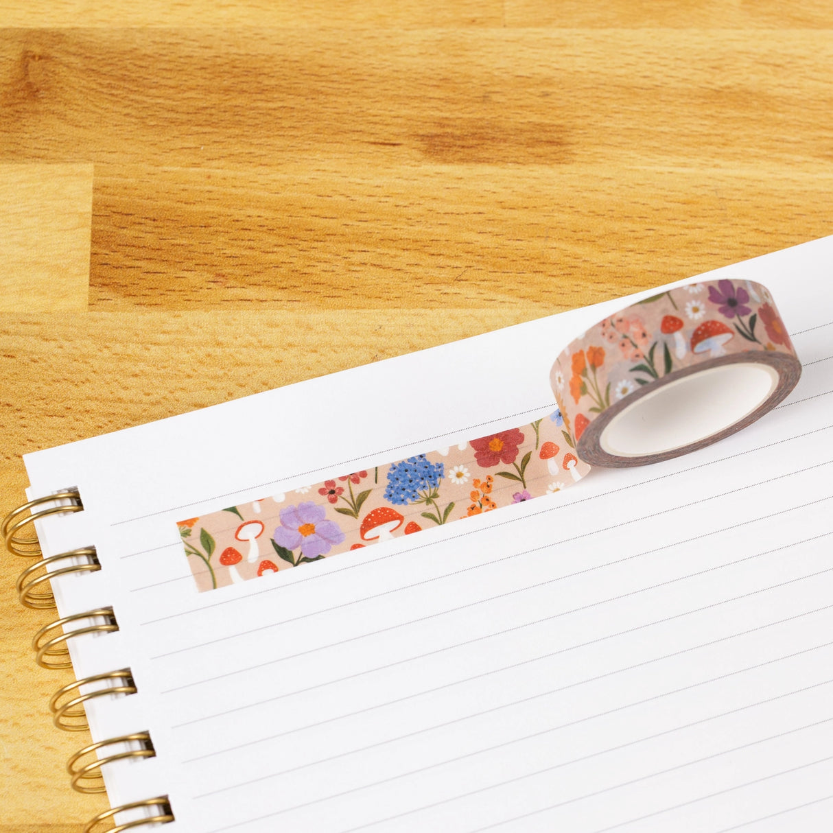 Mushroom Meadows Washi Tape
Our washi tape is made for paper lovers, pen pals, and anyone who gets butterflies in the stationery aisle. Perfect for journaling, scrapbooking, decorating envelopes, or adding a personal touch to planners and calendars. It's gentle on paper, easy to tear by hand, and removable without leaving residue, so you can rearrange, redo, and re-stick as needed.
Design Features:
Each roll measures 15mm wide on a 10m roll
Full color repeating pattern
Washi tape dispenser packagin