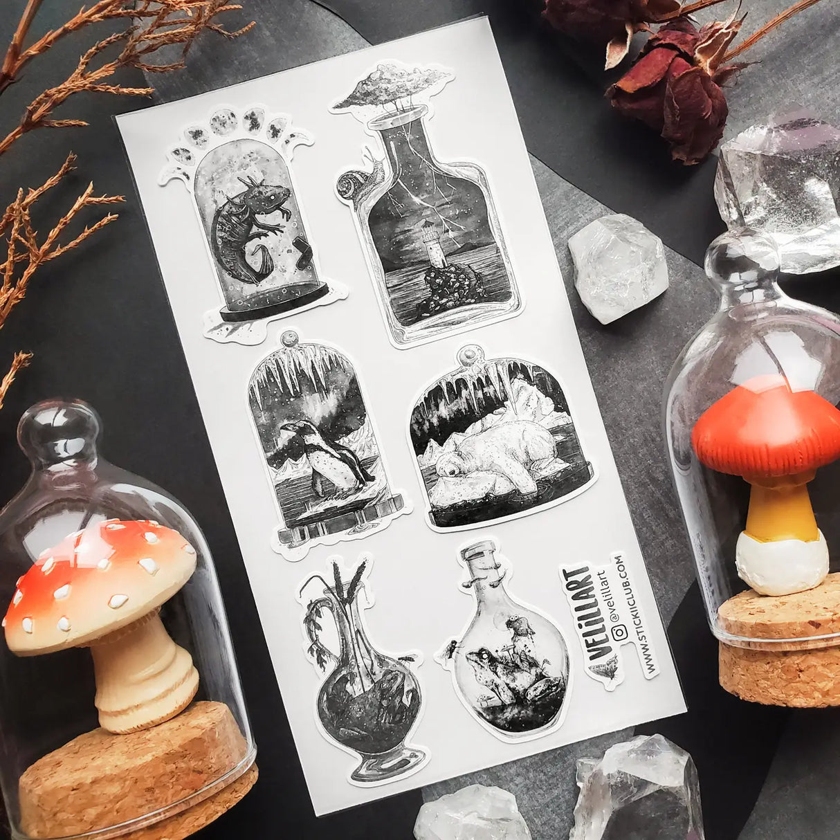STICKII - Mysterious Little Worlds Sticker Sheet
🌩️🐻❄️ Something strange is brewing in @velillart's bottled-up world of wonders! Featuring a lighthouse amidst a storm, polar dreams of ice, and the curious lives of snails, frogs, and a mystical axolotl. This sheet feels like a cabinet of bottled curiosities gathered by a traveler who’s seen places no map could ever capture. Art by: @velillart
Top Coating: None
Adhesive Layer: Paper
Backing Layer: Clear PET
6.69"x3.54"
Weight: 0.03oz
1 Sheet Included
