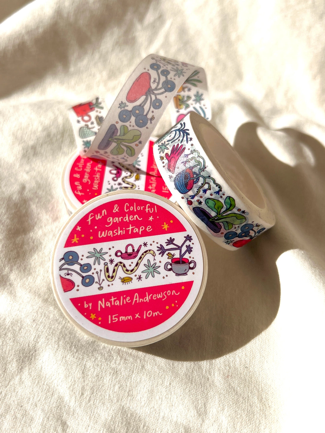 This washi features a vibrant garden with little bugs and even a snake!