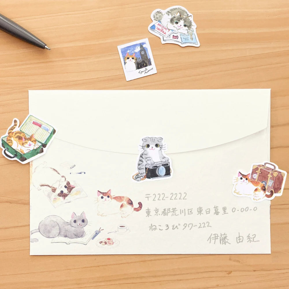 Nekorobi Travel Flake Stickers
So many cats!! These flake stickers can be used for sealing letters, decorating planners, or accessorizing your travel journal. With the theme of traveling with cats, I depicted her looking at guidebooks, helping with packing, and taking photos.
Nekorobi 5th Anniversary
Height 140×Width 63mm
5 Patterns - 20 Sheets
Crepe Paper Stickers