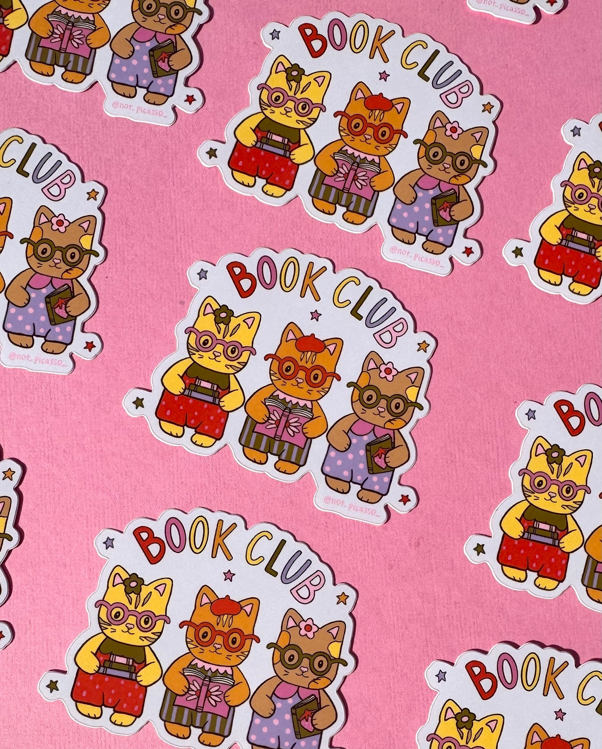 These adorable book themed stickers are perfect for sharing with your book club friends. It features 3 adorable cats with their favorite reads!
These matte vinyl stickers feature an original design and are water, weather, and scratch proof. Perfect for putting on water bottles, computers or just about anywhere else.