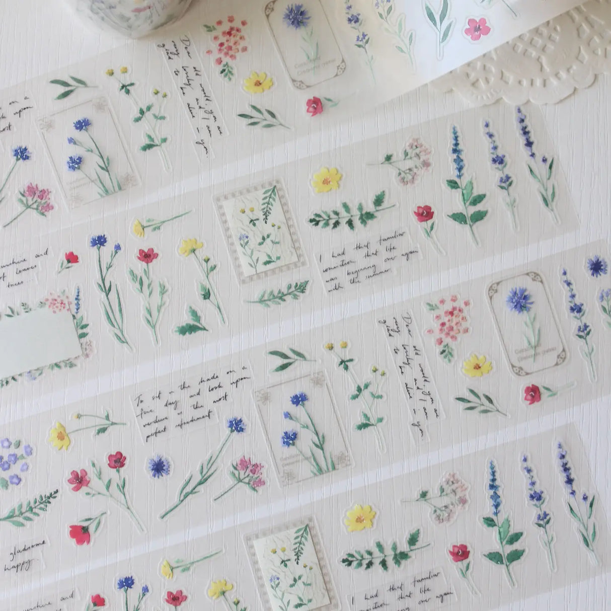 An updated version of our Wildflower PET tape, now with a longer 50cm designer loop for even more creative possibilities.
This wildflower PET tape is designed for journalers, collagers and stationery lovers who want to bring the beauty of the British countryside into their creative projects. Featuring hand-painted watercolour flowers by Rebecca, each illustration is pre-cut and ready to peel - no scissors needed.
Extra wide at 50mm with a matt transparent finish that layers beautifully over any journal pa