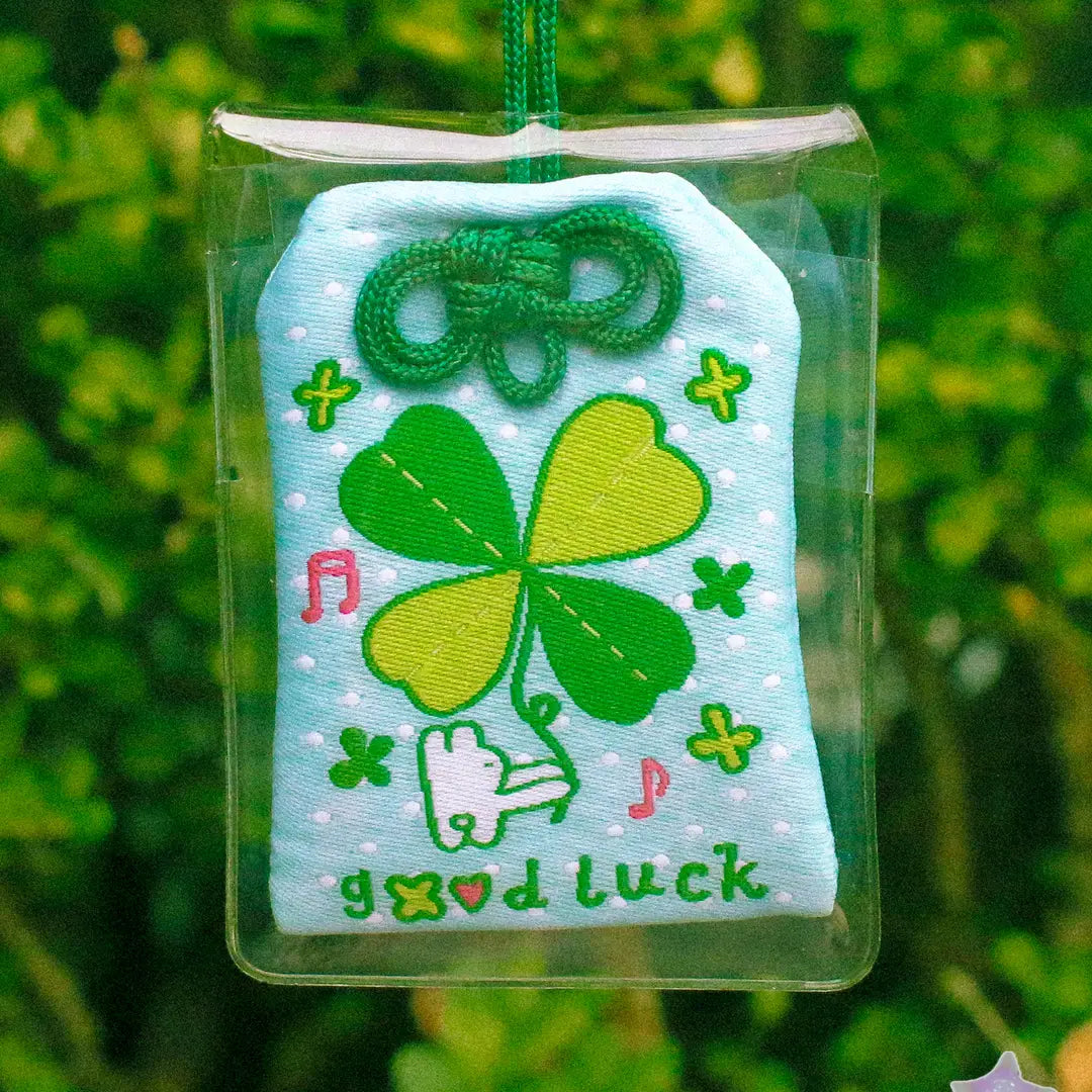 2x2.5 omamori charm with a 8 inch string.
An omamori is a Japanese charm that provides protection and luck!