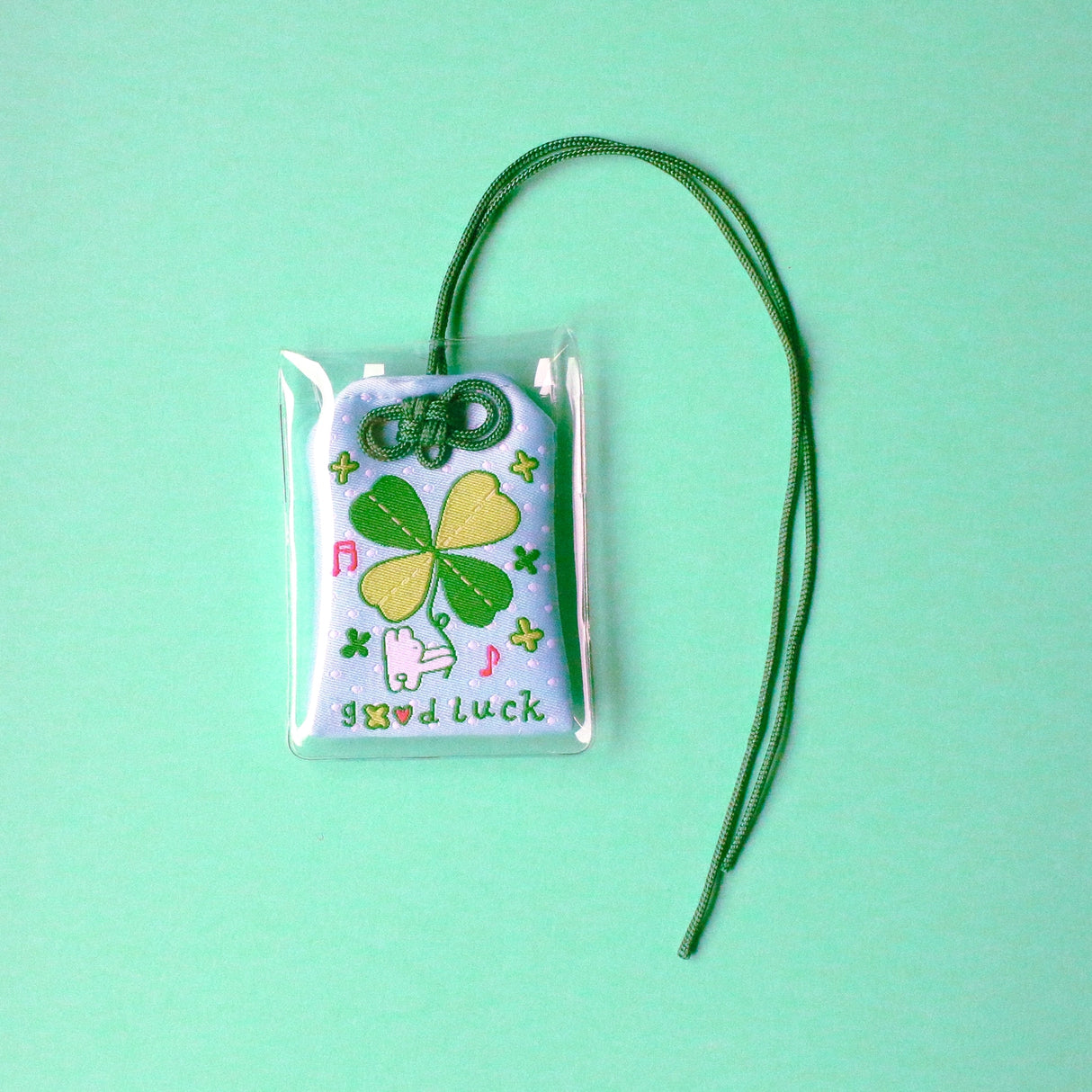 2x2.5 omamori charm with a 8 inch string.
An omamori is a Japanese charm that provides protection and luck!