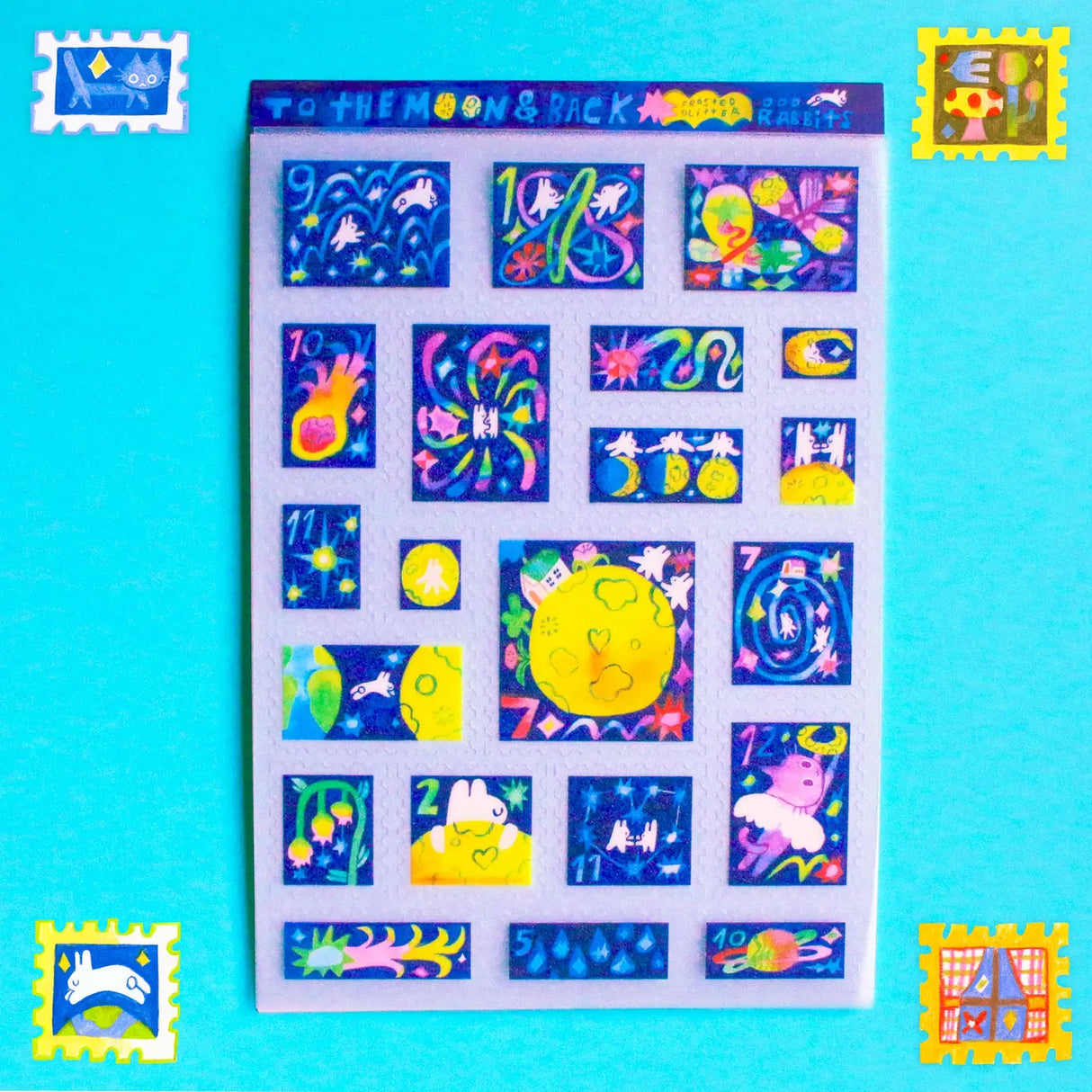 'To the Moon & Back' Frosted Glitter Transparent A6 Sticker Sheet. Stickers are stamp shaped and have a clear blue background.
Not waterproof.
Do not place in areas of high wear (laptops, phone cases, water bottles, etc).
Sticker sheets come packaged in a plastic sleeve.