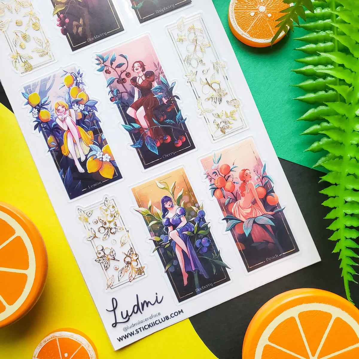 🍒🍋 @ludmilacerafoce’s fruity fashionistas are serving looks inspired by blackberries, raspberries, lemons, cherries, blueberries, and peaches! Draped in juicy colors and surrounded by oversized fruit and foliage, each glamorous girl brings her own bold personality to the garden. Finished with gleaming foil accents, this sheet is one seriously fresh-picked lineup! Art by: @ludmilacerafoce
Top Coating: Gold foil
Adhesive Layer: PVC (plastic)
Backing Layer: Clear PET
6.69" x 3.54".
Weight .03lbs