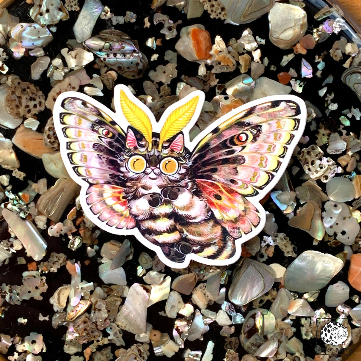 “Pine” is a sticker from the Moth Cat series and is inspired by the Pandora Pinemoth, a native species to Oregon.
Moth Cats are a curious and captivating species. The colorful and detailed illustrations are original paintings on birch wood panels.
+ size: 1.7 x 2.3"
+ permanent adhesive glossy vinyl sticker with solid peel backing
+ scratch and weather resistant material, PVC free
+ packaged and shipped flat
All work and photos ©PAPER PUFFIN Art by K.CARLSON