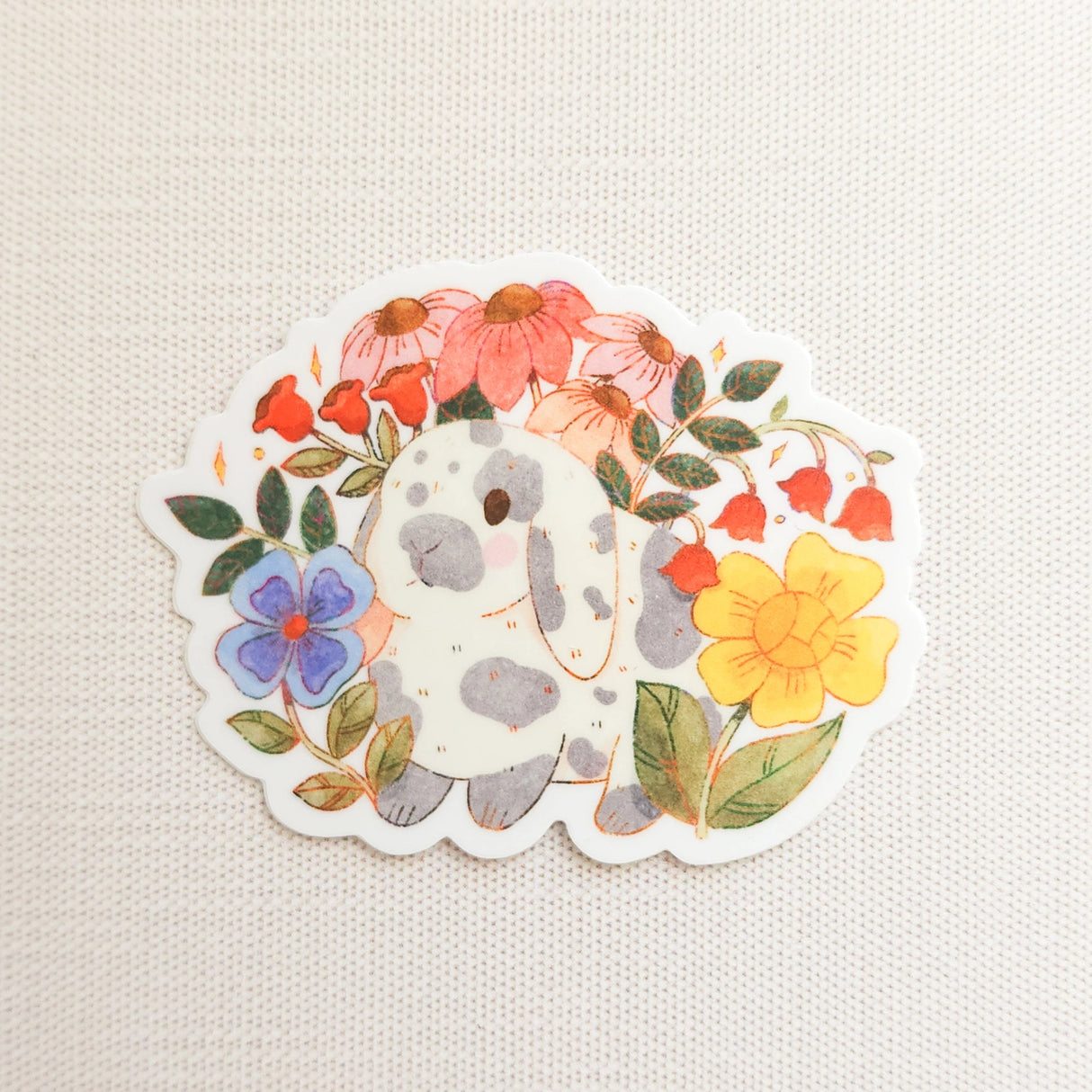 A charming dachshund planter rests among leafy greenery, a thriving cheese plant growing from its back like a small piece of playful décor. This vinyl sticker captures that cozy, plant-filled still life, adding a touch of warmth and whimsy to your everyday essentials.
Made from durable, waterproof vinyl, this sticker is designed to hold up wherever you place it—whether that’s a water bottle, laptop, or journal you reach for daily.