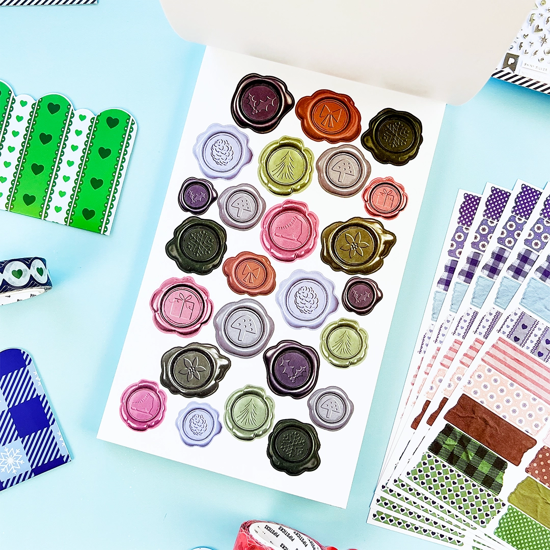 You asked, we delivered! Introducing our new Winter inspired Junk Journal sticker book! With Frames, borders, patterns and alphabets you'll be able to document every moment of your life with whimsy and delight! Perfect to junk journal, collage, and scrapbook your way through the season.