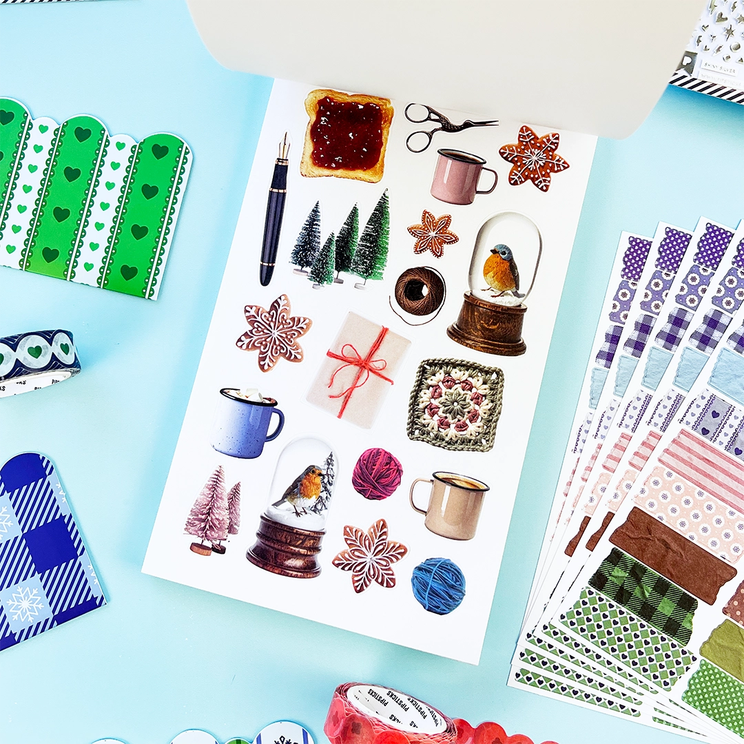 You asked, we delivered! Introducing our new Winter inspired Junk Journal sticker book! With Frames, borders, patterns and alphabets you'll be able to document every moment of your life with whimsy and delight! Perfect to junk journal, collage, and scrapbook your way through the season.