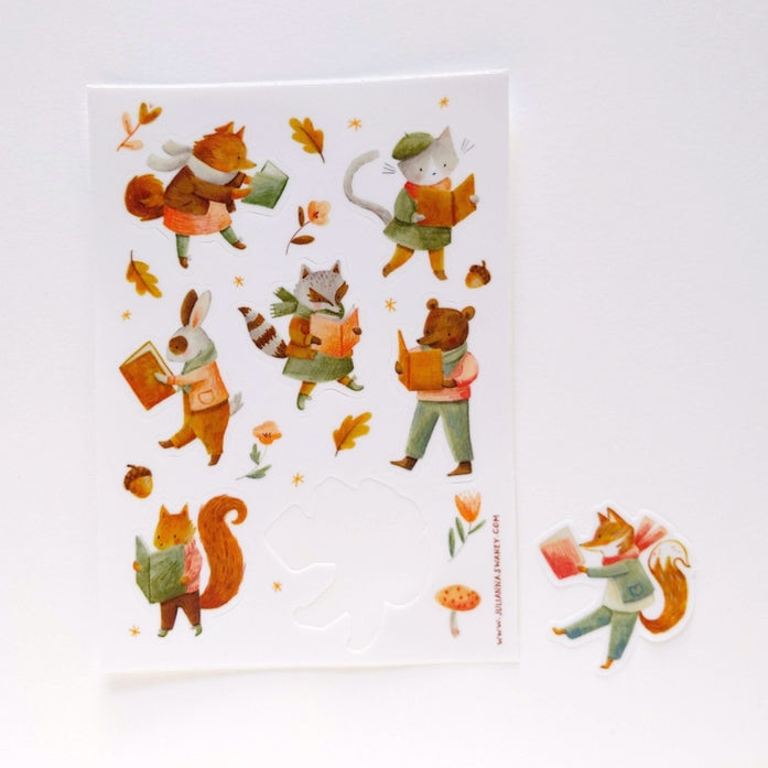 Hoja de calcomanías de animales que leen