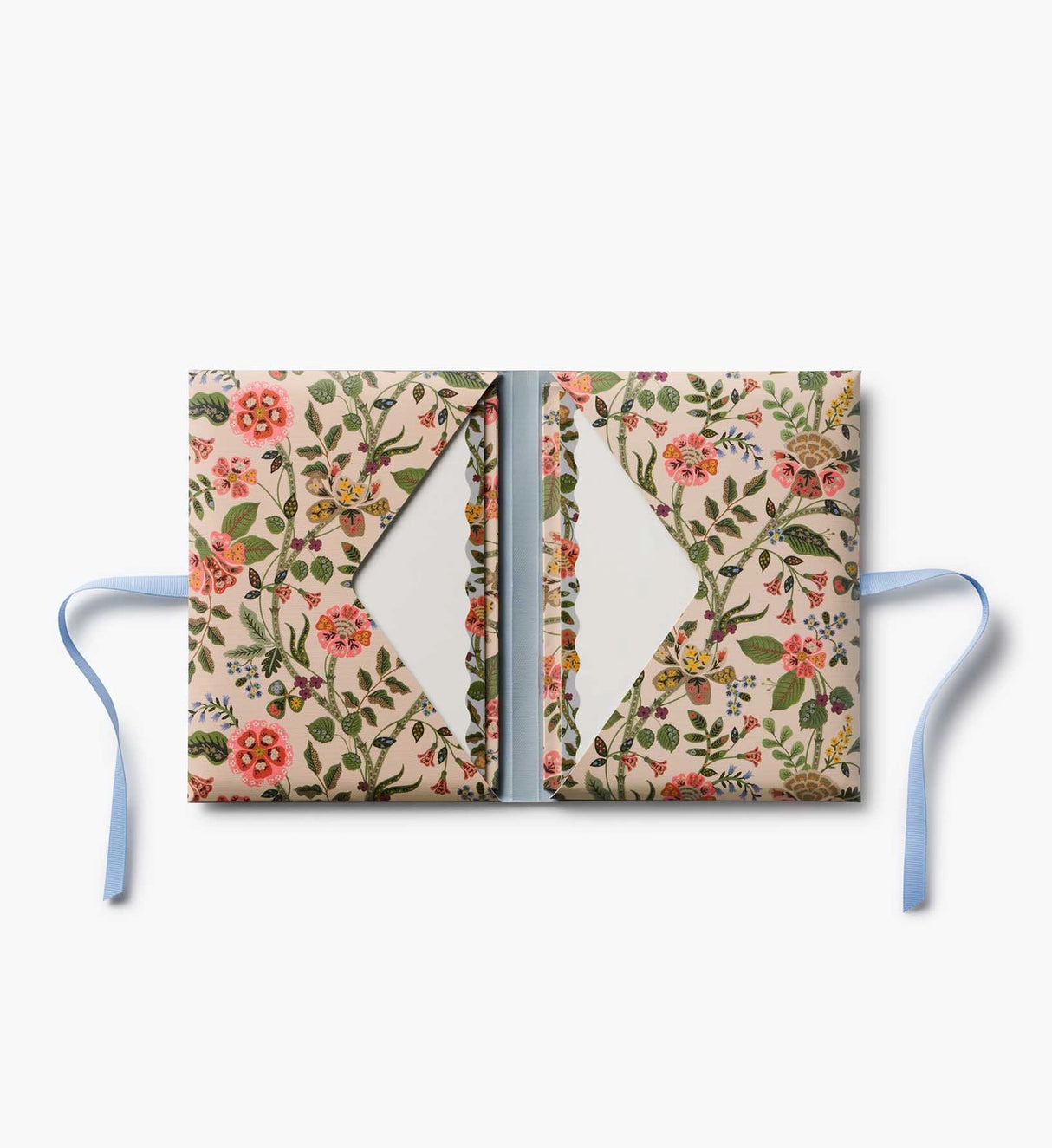A prettier stationery stash, perfect for writing on the go. Printed with Gracie florals in three elegant colorways, this folio-style set includes 12 notecards with matching envelopes, tucked inside a coordinating folder with a ribbon-tie closure.