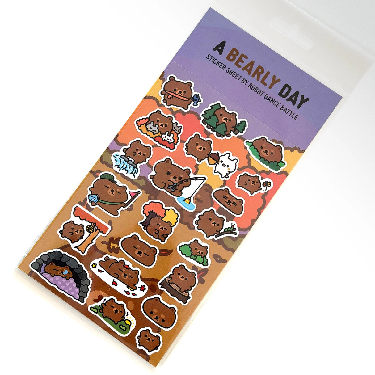 Robot Dance Battle Sticker Sheet - A Bearly Day Planner
This is part of a new series of sticker sheets that feature different "days".
There are 21 individual stickers on the sheet full of a bearly trying bear.
They are vinyl stickers on a clear plastic sheet with a backing card and packaging that's ready to display.
The sticker sheet is 3.75 x 5.8"