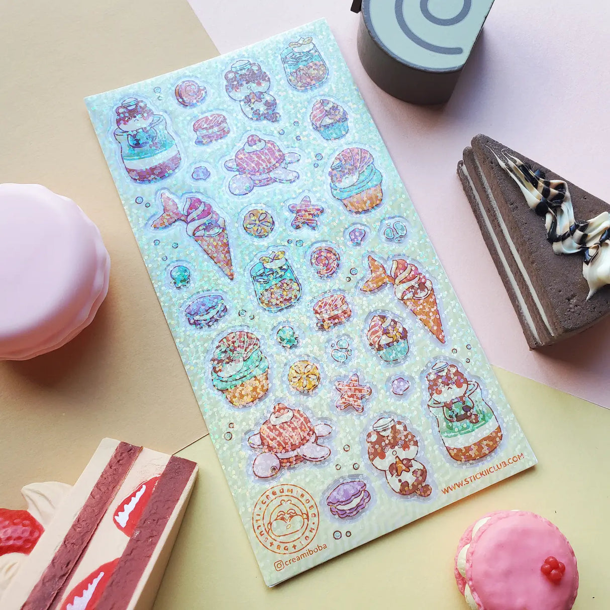 STICKII - Sea Sweets Sticker Sheet
🍦🐚 Get ready for an undersea foodie adventure with @creamiboba’s adorable little sea otter! We're splashing into a world of sweet ocean-inspired treats - imagine biting into a fin-tastic ice cream, munching on adorable starfish cookies, and savoring delightful turtle macarons. Can you believe all these yummy treasures were hiding beneath the waves? Tell us which underwater sweet makes your heart swim with joy! ✨
Art by: @creamiboba
Top Coating: Holo glitter
Adhesive La