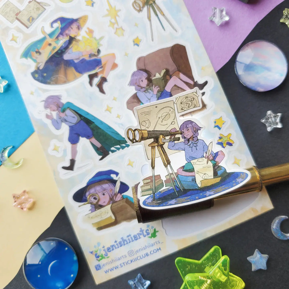 💫🔭 We gotta introduce you to Stella! @jenishiiarts_’s adventurous star-chasing witch with a mission to return fallen stars to the sky! I mean, what’s cooler than that? When she’s not busy studying the celestial lights, face buried in a book or peering through her telescope, you can find her soaring through the cosmos, hopping from star to star. Cheer her on with this amazing sticker sheet and postcard set! Art by: @jenishiiarts_
Top Coating: None
Adhesive Layer: Paper
Backing Layer: Paper
6.69" x 3.54".