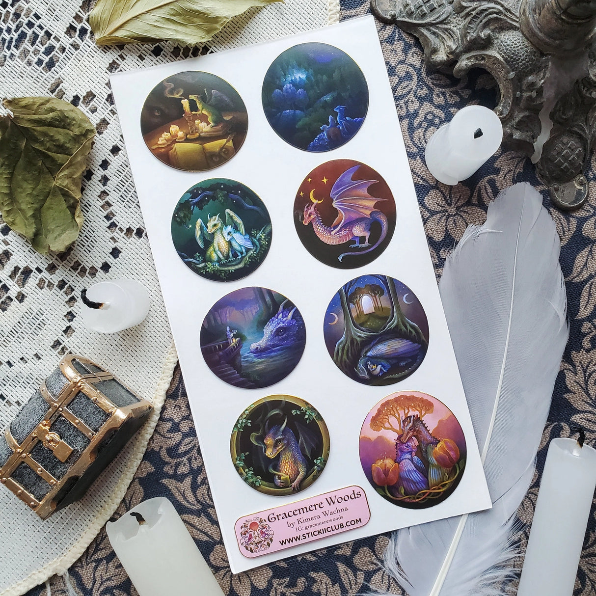 🌙🐲 Bathed in moonlight, @gracemerewoods’ dragons stand watch as gentle guardians of ancient forests, glowing gateways, and sacred firelight. Each scene reveals their role as protectors of balance, beauty, and magic. With dreamy brushwork, luminous atmosphere, and timeless fantasy charm, this sheet brings the legend of these mystical keepers to life.
Art by: @gracemerewoods
Top Coating: Gold Foil
Adhesive Layer: Paper
Backing Layer: Clear PET
6.69" x 3.54".
Weight - 0.03lbs.
1 sheet included