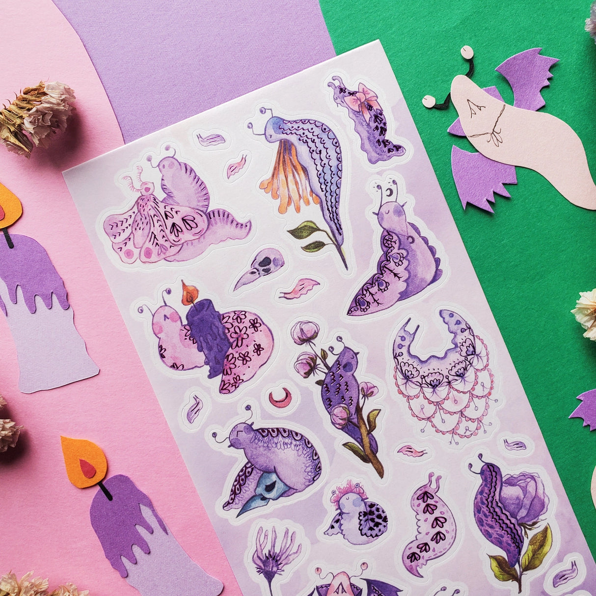 STICKII Gothic Garden Slugs Sticker Sheet
🐌💜 Okay what’s more magical than these gothic cuties from @agataplank? These slugs are dramatic and slow which is a such a vibe to strive for as they are dressed up in their softest florals, ruffliest lace, and you have to have a cape. Then do all the magical gothic activities with spooky gardens, spell books and charm!