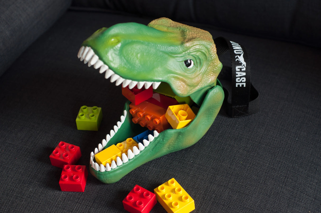 Keep your snacks safe from extinction with this fierce T-Rex head lunchbox. Made from durable polypropylene with a secure silicone lining and a sturdy fabric carry handle, it’s tough enough for any Jurassic adventure. Big enough for sandwiches, fruit, and treats — or for storing toys, crayons, or fossils — this versatile case is perfect for school, play, or travel.