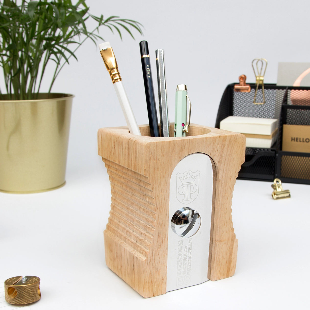 Giant pencil sharpener stationary organizer and pen pot/holder - perfect for organizing your desk at the office, in the classroom or at home. This smart and original product design keeps desks in prime working condition.
Made from extra-strong material: sustainable Rubber wood and silver stainless steel, it’s an elegant and classic design that is instantly recognizable.