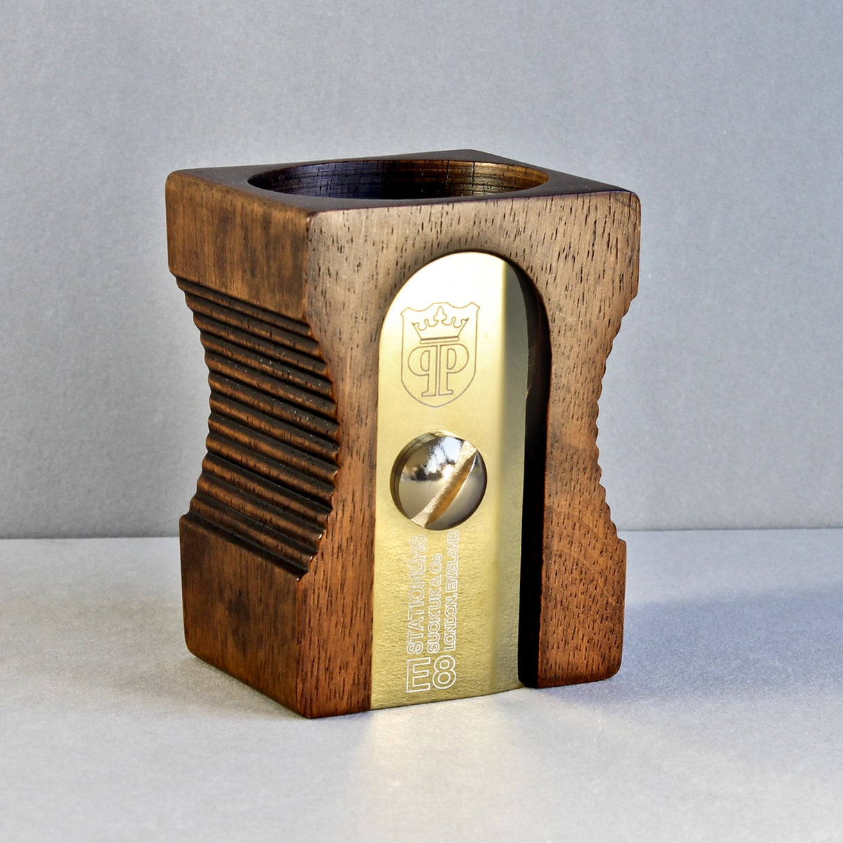 Hugely iconic and instantly recognizable, a design classic desk-tidy. This simple pencil-pot will keep your pencils, pens and desk top clutter looking sharper than the usual dull desk accessory. The "Double" features an extra space for paper-clips and smaller accessories. The "Dark" has a gold plated blade.