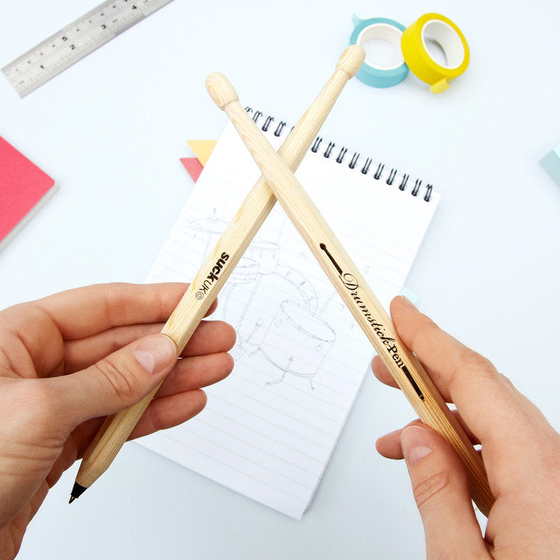 For desk drummers, restless tappers & future rock legends. A pair of drumsticks cleverly disguised as pens, ready for meetings, maths lessons or impromptu solos on the nearest tabletop. Perfect for anyone convinced they're the next Phil Collins. Practice your paradiddles, look busy at work, then get back to annoying the neighbours. Smaller than a drum kit, cheaper than a drum kit, and considerably easier to fit in a pencil case. A great gift for fidgety fingers.
Black Ink
Ballpoint pens shaped like dru