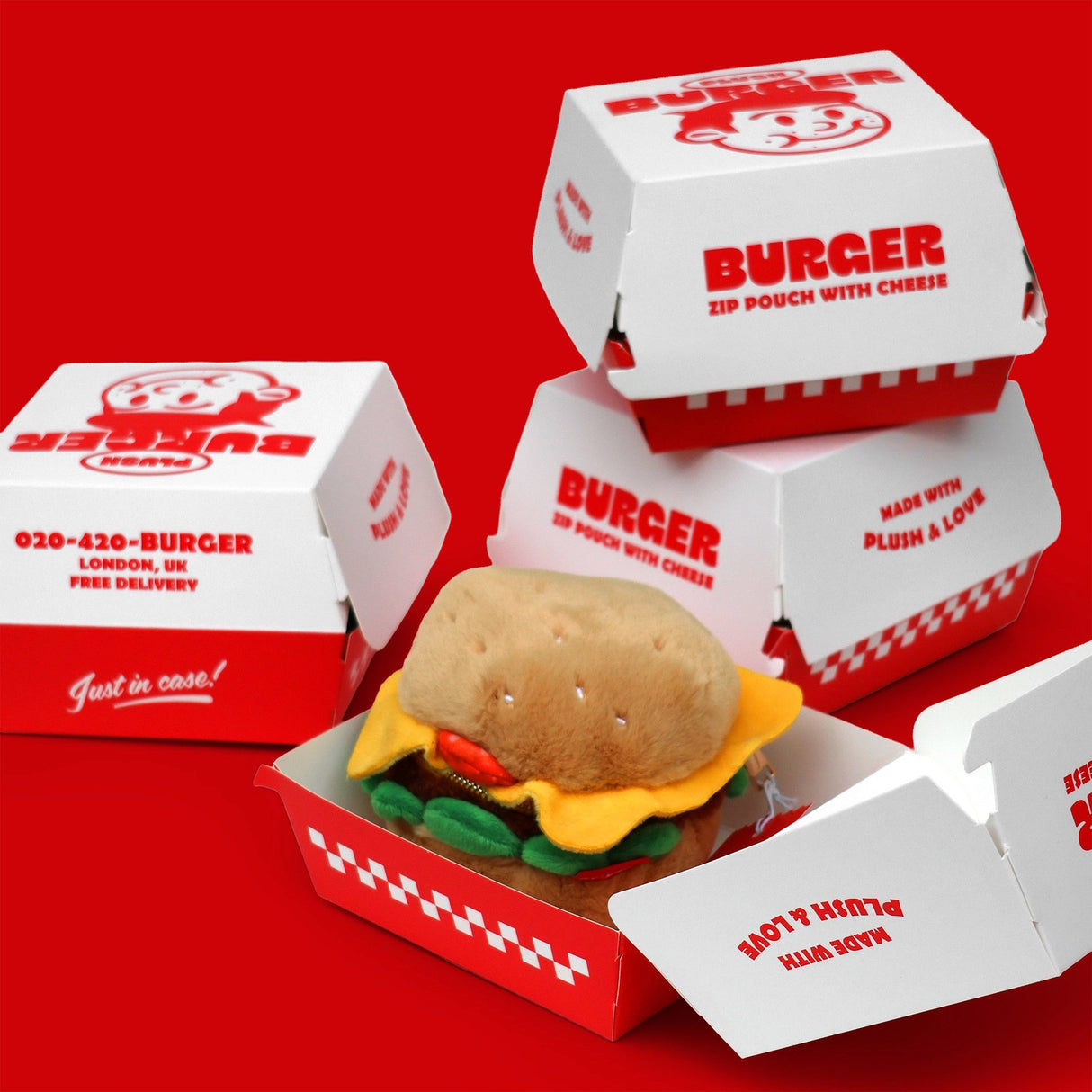 SUCK UK Plush Pouch - Hamburger
Plush burger shaped case with gold zip. Store your belongings amongst the salad and the melted cheese. Yum!
Juicy, tasty, sweet and sour. And very cute. Stuff your stuff into something soft, and squishy. Delicious looking plush zip pouches look like foodie treats but instead of calories, they hold your everyday essentials. From cheesy slices to sickly treats, each pouch is designed to be irresistible and practical. Perfect for pens, cables, cosmetics, or whatever bits and b