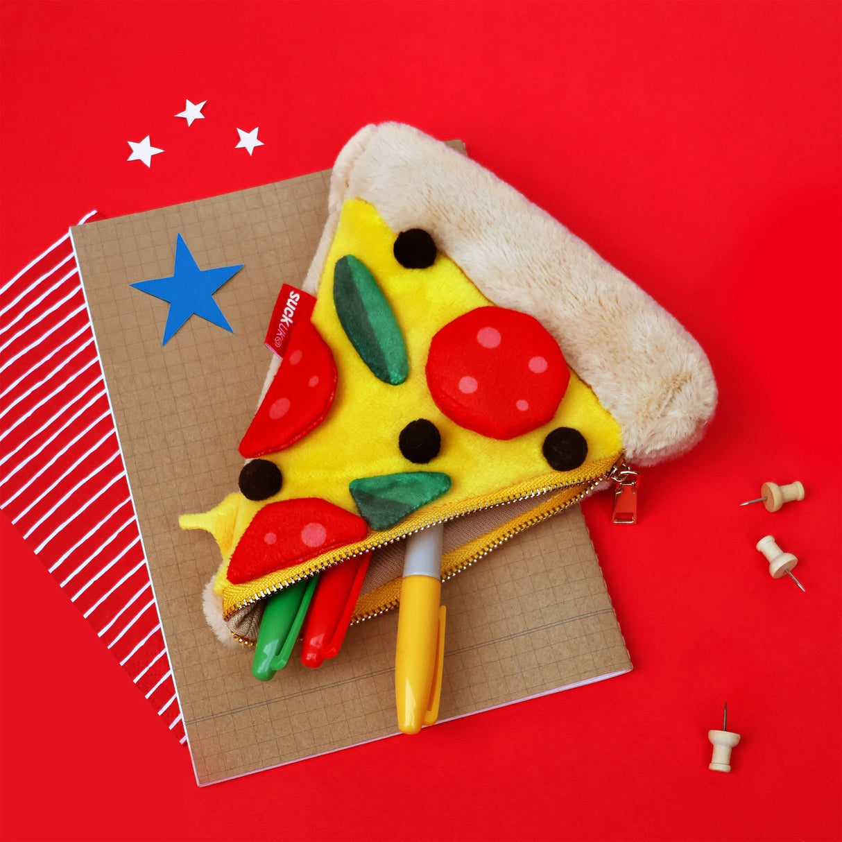 Store stationery & small items.
Plush pizza shaped case with gold zip. Store your belongings in style by tucking them into this slice of delicious pizza. Yum!
Plush Zip Pouches designed and made by SuckUK
Juicy, tasty, sweet and sour. And very cute. Stuff your stuff into something soft, and squishy. Delicious looking plush zip pouches look like foodie treats but instead of calories, they hold your everyday essentials. From cheesy slices to sickly treats, each pouch is designed to be irresistible and practi