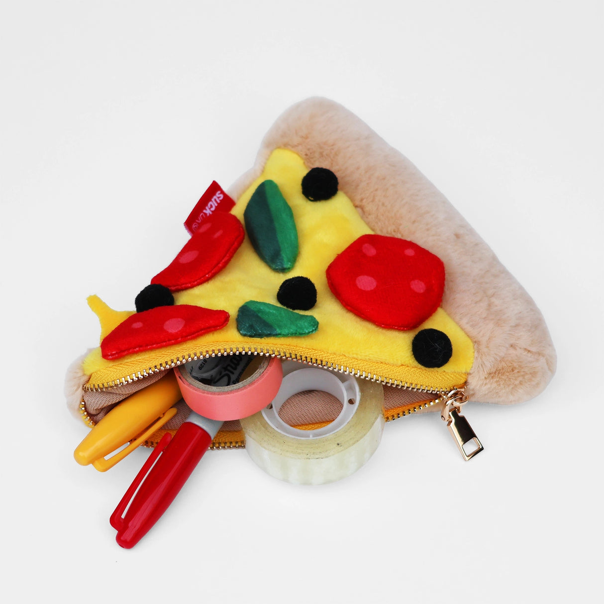 Store stationery & small items.
Plush pizza shaped case with gold zip. Store your belongings in style by tucking them into this slice of delicious pizza. Yum!
Plush Zip Pouches designed and made by SuckUK
Juicy, tasty, sweet and sour. And very cute. Stuff your stuff into something soft, and squishy. Delicious looking plush zip pouches look like foodie treats but instead of calories, they hold your everyday essentials. From cheesy slices to sickly treats, each pouch is designed to be irresistible and practi