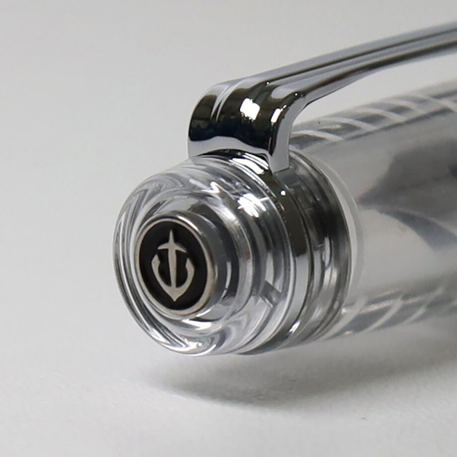 The Sailor Pro Gear Transparent fountain pen has a clear barrel with silver trim. The pen has been fitted with a 14k solid gold nib that has been rhodium plated to match.
Pro Gear Slim size
14k gold nib with Rhodium plating
Includes 2 proprietary black ink cartridge and 1 converter