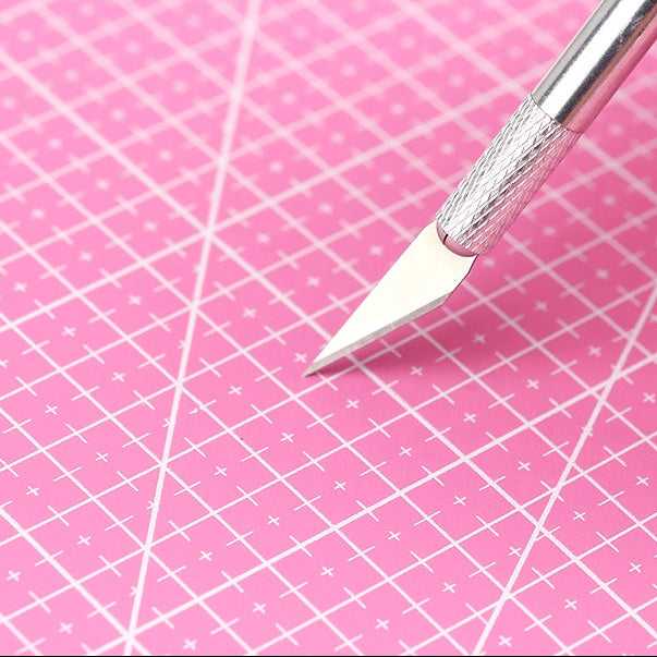 Self-Healing Cutting Mat - A3
Upgrade your crafting workspace with this durable A3 Self‑Healing Cutting Mat, designed to support all your cutting, trimming, and precision‑crafting needs. Whether you're working on scrapbooking, sewing, model building, or everyday DIY projects, this mat provides a reliable, smooth surface that protects your tools and your table.
The self‑healing surface reseals after each cut, keeping the mat looking clean and extending its lifespan. Clear grid lines help you measure, align
