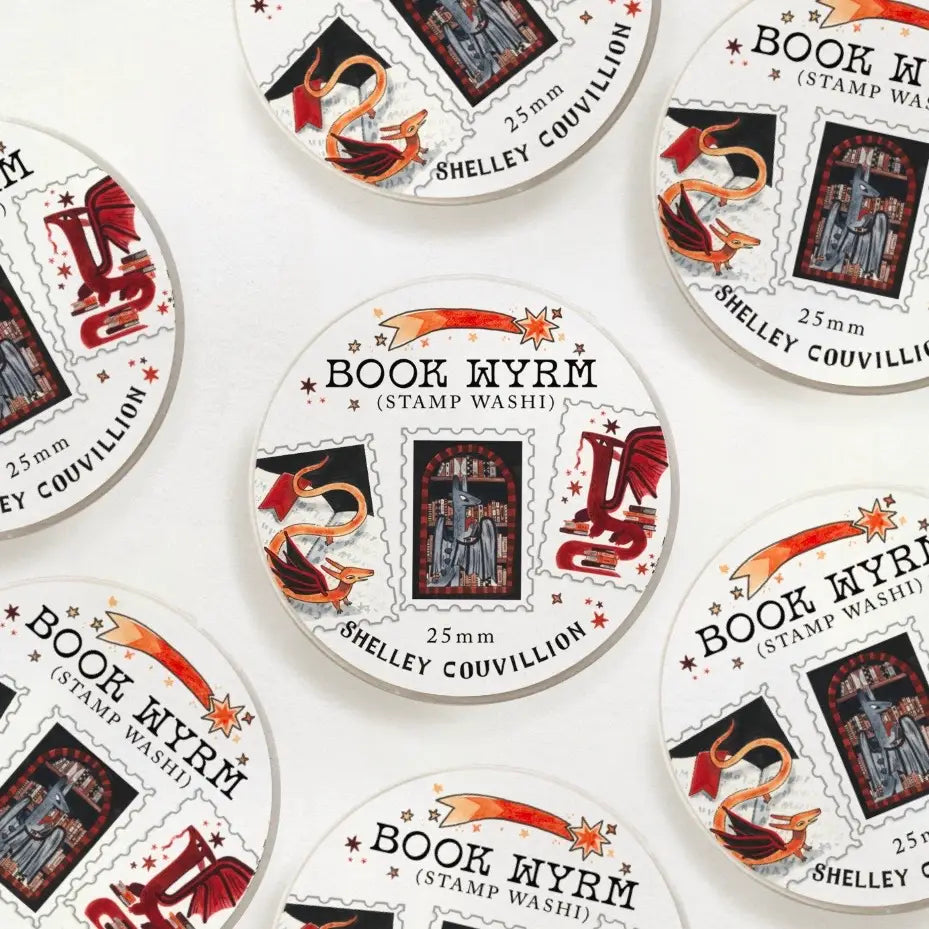 Book Wyrm Stamp Washi Tape – Dragons Who Hoard Books!
📚🐉 Why hoard gold when you can hoard books?
Meet the Book Wyrms — wise, whimsical dragons who’ve traded their treasure chests for full bookshelves. Perfect for bookworms, dragon lovers, fantasy fans, and anyone whose TBR pile is starting to look a little monstrous (in the best way).
💌 Stamp-Style Design
This tape is designed with individual stamp-like panels, making it great for cutting and using like stickers — ideal for journaling, snail mail, or a