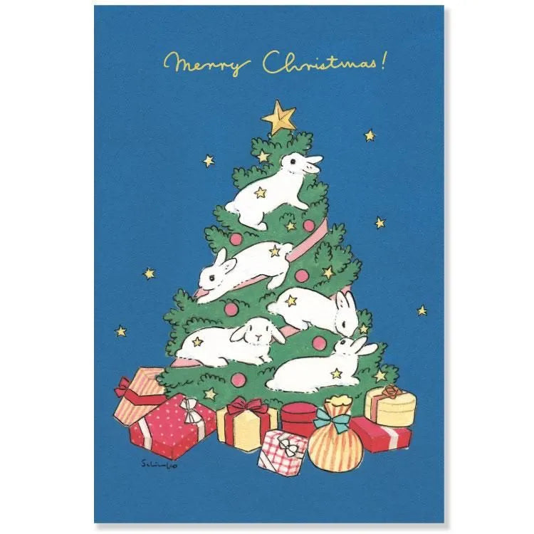 This postcard is packed with the unique world of Shinako Moriyama, where the rabbits have become decorations on the Christmas tree. It features a beautiful gold leaf message. These are warm postcards brighten up your Christmas atmosphere.