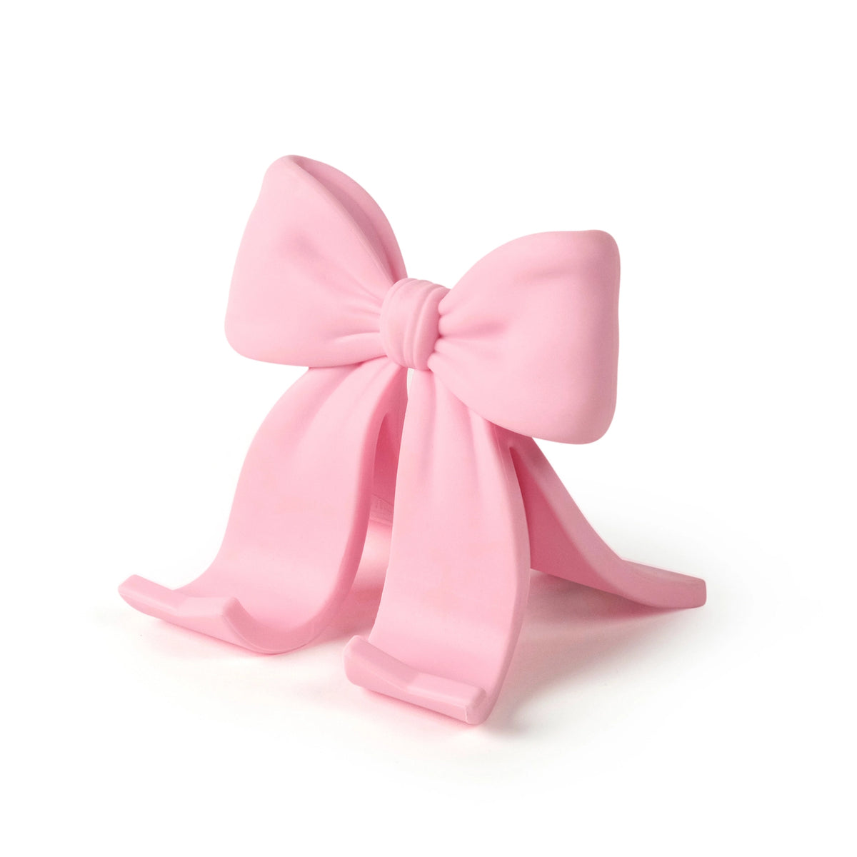 Sitting Pretty Bow Phone Stand
Why settle for a boring stand when you can have your phone Sitting Pretty? Fred’s coquette-inspired phone stand features a cute bow design that’s pretty, pink, and perfectly poised for scrolling, streaming, and staying hands-free. Made from soft-touch rubber, it’s equally fashionable as it is functional.
Measures 2.6" x 2.4" x 2.4"
Design by Winsor Pop, Fred Studio.