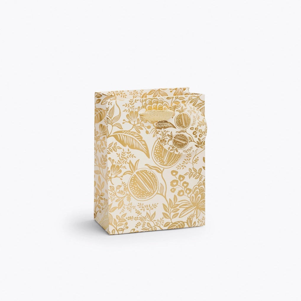 Giving gets even more special with our gift bags, which feature charming extras like gold foil accents, cotton ribbon handles, and a coordinating “To” and “From” tag.
Small: 6 x 4.5 x 0.3 in
Coated paper with cotton ribbon handles
Printed in full color and UV gold glitter
Gold lurex ribbon handles
Cardboard floor insert