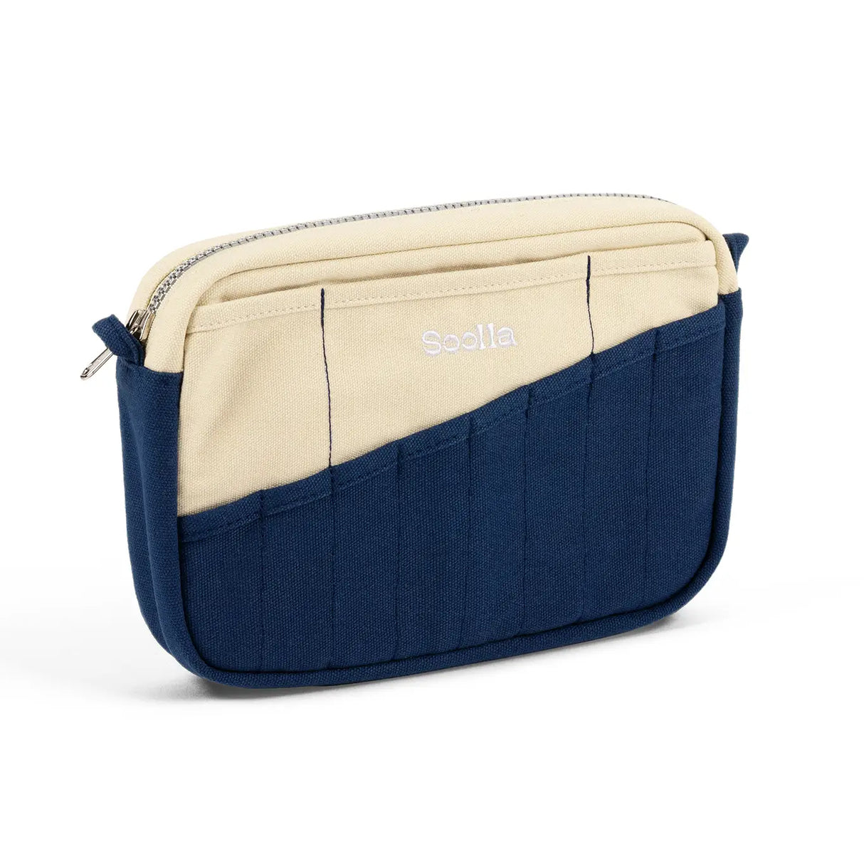 A compact carry-all pouch for artists, makers, and stationary lovers who appreciate a little order in their chaos. Structured enough to hold its form, soft enough to fit anywhere, and fully machine-washable for the days that get a little messy — your tools, pens, and creative essentials stay safe, visible, and ready wherever you go.
Inside, 20 pockets make space for art supplies, stationary essentials, and an A5 notebook, all secured by a smooth YKK zipper. Sized to fit within larger bags or carry on its o