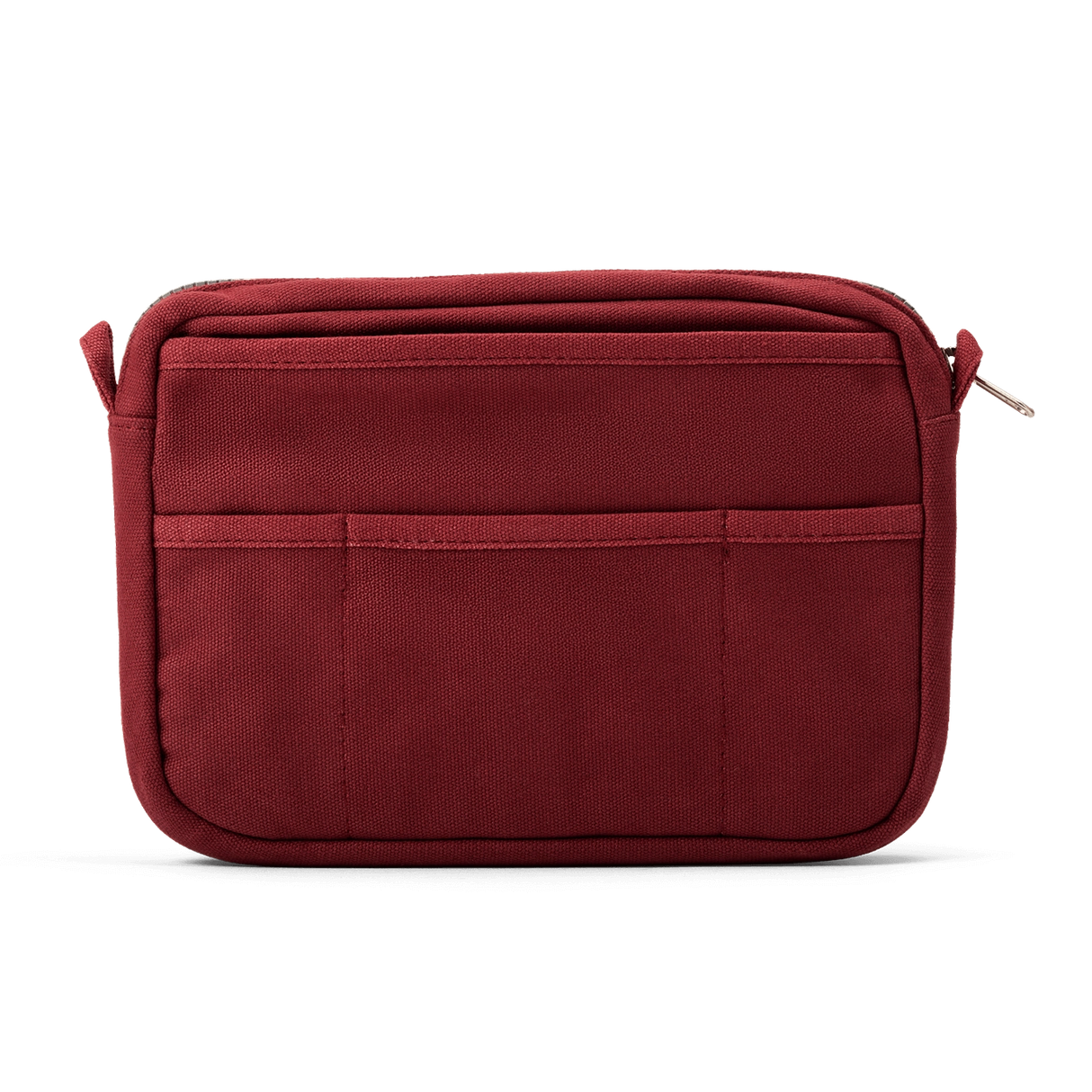 Front layout: 8 slanted pockets + 3 directly behind
Interior: Main compartment fits an A5 notebook; two open compartments on each wall
Back panel: 3 wide exterior pockets + one full-length slip pocket
Quick-drying duck canvas — sturdy, breathable, and machine-washable
Convertible design — hooks for your own strap or a Soolla strap (coming soon)
Structured silhouette — holds its shape even when lightly packed
Full-width YKK zipper — smooth and durable
Compact profile — fits inside larger bags or