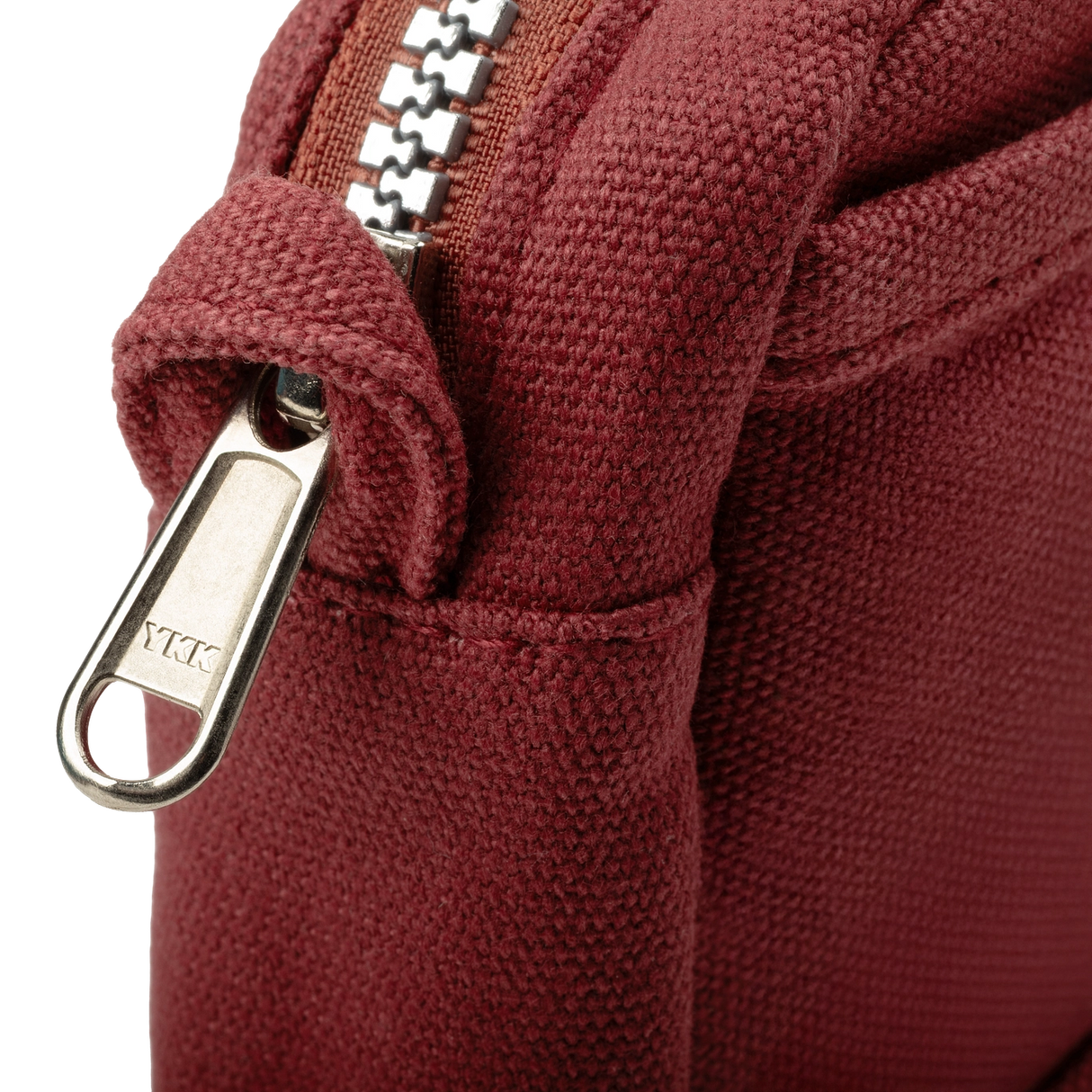 Front layout: 8 slanted pockets + 3 directly behind
Interior: Main compartment fits an A5 notebook; two open compartments on each wall
Back panel: 3 wide exterior pockets + one full-length slip pocket
Quick-drying duck canvas — sturdy, breathable, and machine-washable
Convertible design — hooks for your own strap or a Soolla strap (coming soon)
Structured silhouette — holds its shape even when lightly packed
Full-width YKK zipper — smooth and durable
Compact profile — fits inside larger bags or