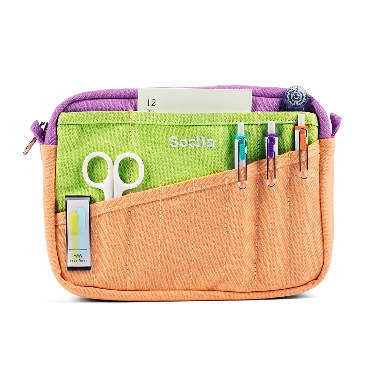 A compact carry-all pouch for artists, makers, and stationary lovers who appreciate a little order in their chaos. Structured enough to hold its form, soft enough to fit anywhere, and fully machine-washable for the days that get a little messy — your tools, pens, and creative essentials stay safe, visible, and ready wherever you go.
Inside, 20 pockets make space for art supplies, stationary essentials, and an A5 notebook, all secured by a smooth YKK zipper. Sized to fit within larger bags or carry on its o