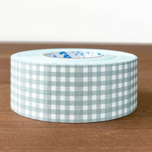 Stamp Marche Gingham Label Sticker Roll - Dusty Blue
Label stickers with Stamp Marche original designs. These are stickers originally for price tag applicators,now featuring a gingham check pattern! They can also be used to seal letters and envelopes, or as decorative materials for your planner. Fold them in half to use as index stickers or write or stamp them. Each pack contains 1,000 stickers with the same design, making them ideal for daily use or sharing.
Product Size: Approx. 55 x 21.6 mm i