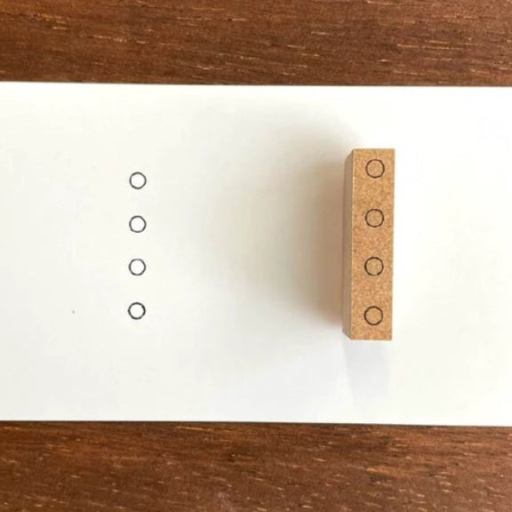Stamp Marche Planner Check Box Wooden Stamp - Circles
Add a touch of charm to your daily planning with this beautifully crafted wooden stamp from Stamp Marche. Designed for journals, planners, and memos, this stamp is perfect for filling small spaces with neat checkboxes. It’s ideal for marking tasks, tracking habits, or adding a sweet decorative accent to any page. Made in Japan with high‑quality wood and rubber, it delivers crisp impressions and a delightful handmade feel.
Stamp size: approx. 16 mm