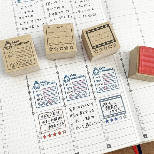 Stamp Marche Planner Hibilog Wooden Stamp - Reading Log
Add a touch of charm to your daily planning with this beautifully crafted wooden stamp from Stamp Marche. Designed for journals, planners, and memos, this stamp is perfect for filling small spaces with neat checkboxes. It’s ideal for marking tasks, tracking habits, or adding a sweet decorative accent to any page. Made in Japan with high‑quality wood and rubber, it delivers crisp impressions and a delightful handmade feel.
Stamp size: approx.&nbs