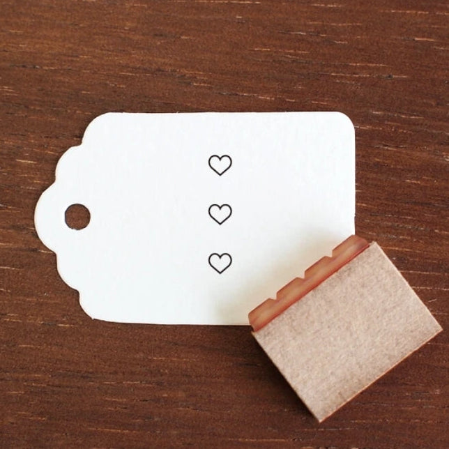 Add a touch of charm to your daily planning with this beautifully crafted wooden stamp from Stamp Marche. Designed for journals, planners, and memos, this stamp is perfect for filling small spaces with neat checkboxes. It’s ideal for marking tasks, tracking habits, or adding a sweet decorative accent to any page. Made in Japan with high‑quality wood and rubber, it delivers crisp impressions and a delightful handmade feel.
Stamp size: approx. 16 mm (H) x 3.5 mm (W)