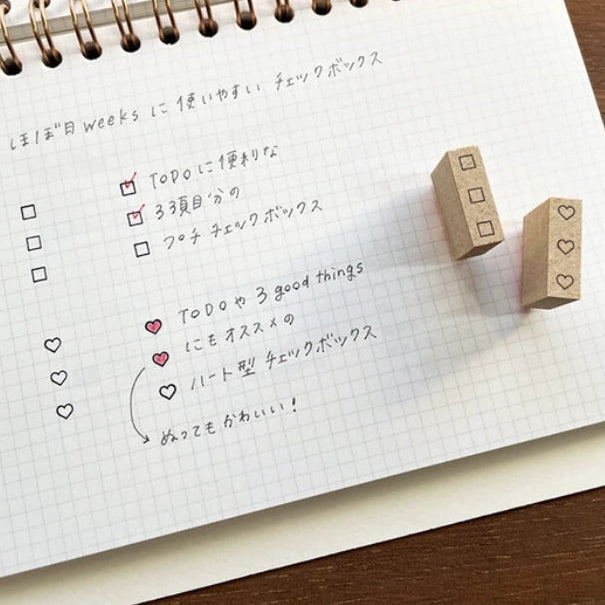 Add a touch of charm to your daily planning with this beautifully crafted wooden stamp from Stamp Marche. Designed for journals, planners, and memos, this stamp is perfect for filling small spaces with neat checkboxes. It’s ideal for marking tasks, tracking habits, or adding a sweet decorative accent to any page. Made in Japan with high‑quality wood and rubber, it delivers crisp impressions and a delightful handmade feel.
Stamp size: approx. 16 mm (H) x 3.5 mm (W)