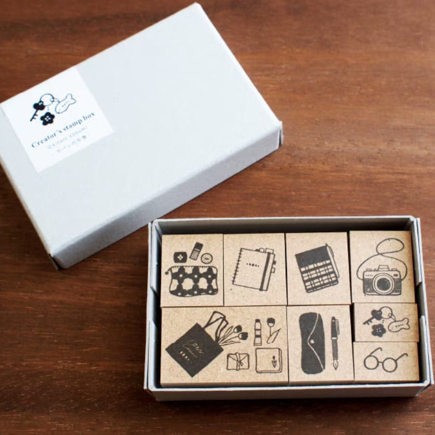 Step into a world of everyday charm with the Creator’s Stamp Box – Inside the Bag, a delightful collaboration between Stamp Marche and Sonomi Kogei. This curated set captures the little treasures we carry with us—perfect for adding personality and storytelling to your journal pages, planners, scrapbooks, and creative projects.
Each stamp is crafted with a solid wooden mount and high‑quality rubber, giving you crisp, clean impressions every time.
This set includes 8 stamps.
Stamp size: approx.&nb