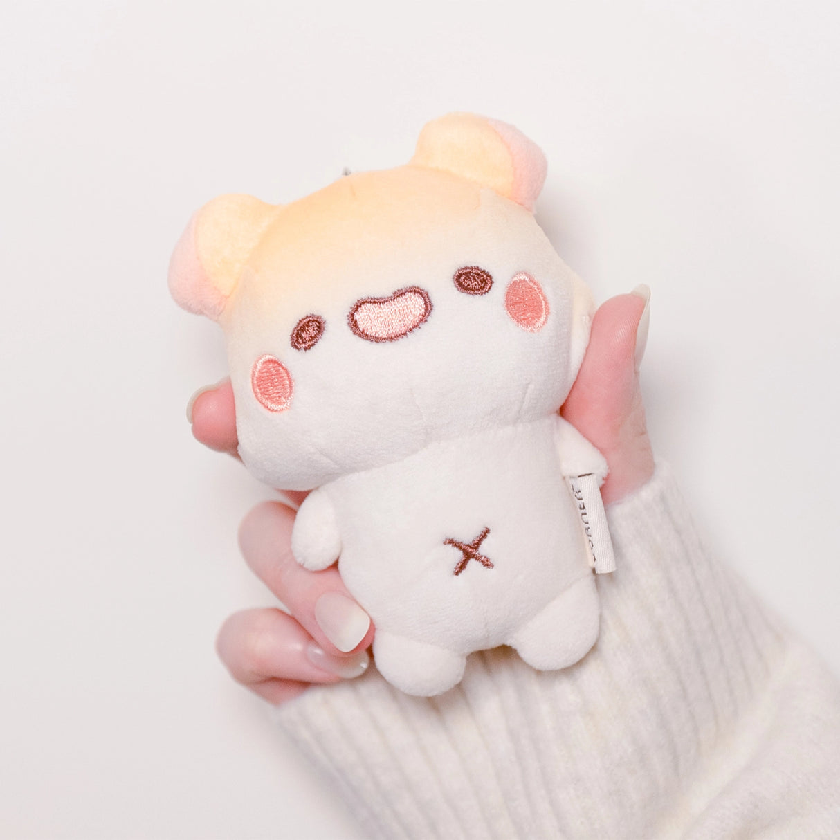 A cute Muffinmaru plush Keychain made of soft and premium materials. Comes with a detachable chain so you can bring this mini Muffinmaru will on many foodie adventures with you.
Approximate Dimensions: plush part 4.5" tall (11cm)
Hand wash only and do not tumble dry, dry clean or iron