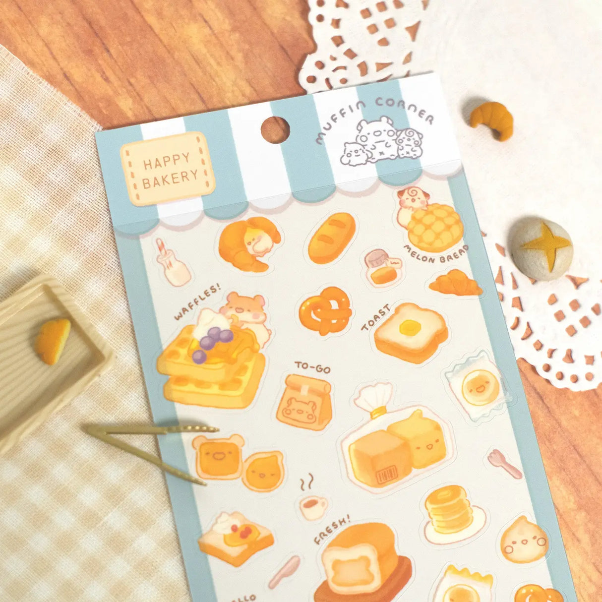 The Happy Bakery sticker collection features Muffinmaru and friends alongside delicious baked goods. This sticker sheet is filled with freshly baked bread, perfect for adding a sprinkle of cuteness to your planner or journal.
Dimensions: 3.5" x 7.8" (9cm x 20cm)
Material: PET
Quantity: 1 sheet